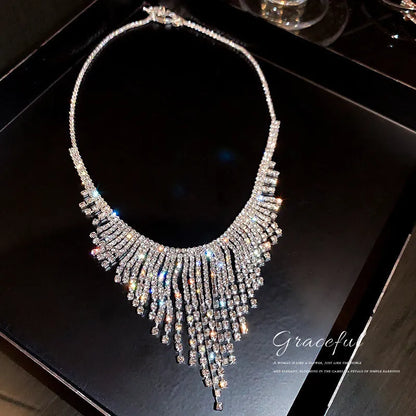 Silver tone tassel necklace with geometric alloy pendant and ball bead chain, 21-50cm circumference