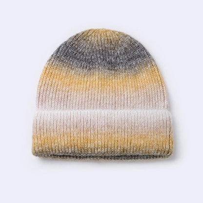 Gradient yarn knitted hat with tapered top in light blue colour showing knitted texture