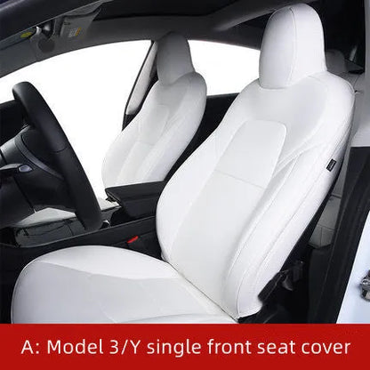Black PVC seat cover installed on a Tesla Model 3 front seat, showing binding-style edges.
