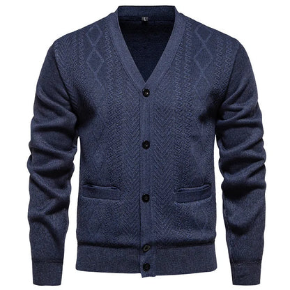 Man wearing a striped brown cardigan sweater with long sleeves and wool lining.