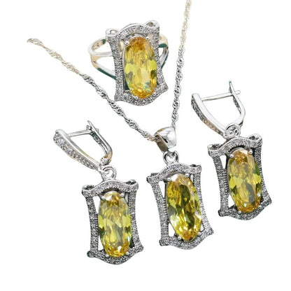 Women's yellow and olive alloy zircon jewellery set with necklace, earrings, ring, and bracelet on a snake bone chain.
