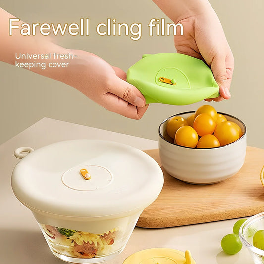 Three silicone freshness lids in beige, green, yellow colours showing 18cm, 10cm, 6.5cm diameters