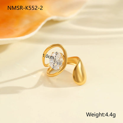 Geometric zircon ring showing round, oval and quadrangular design elements in stainless steel with electroplated finish