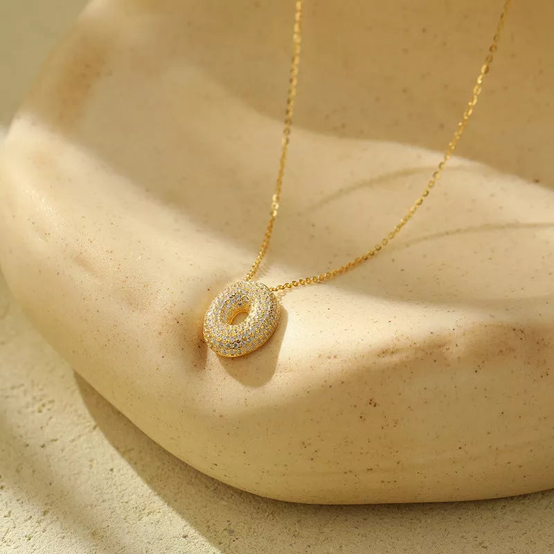 Stainless steel initial pendant necklace with zircon accents, personalized with your choice of letter.