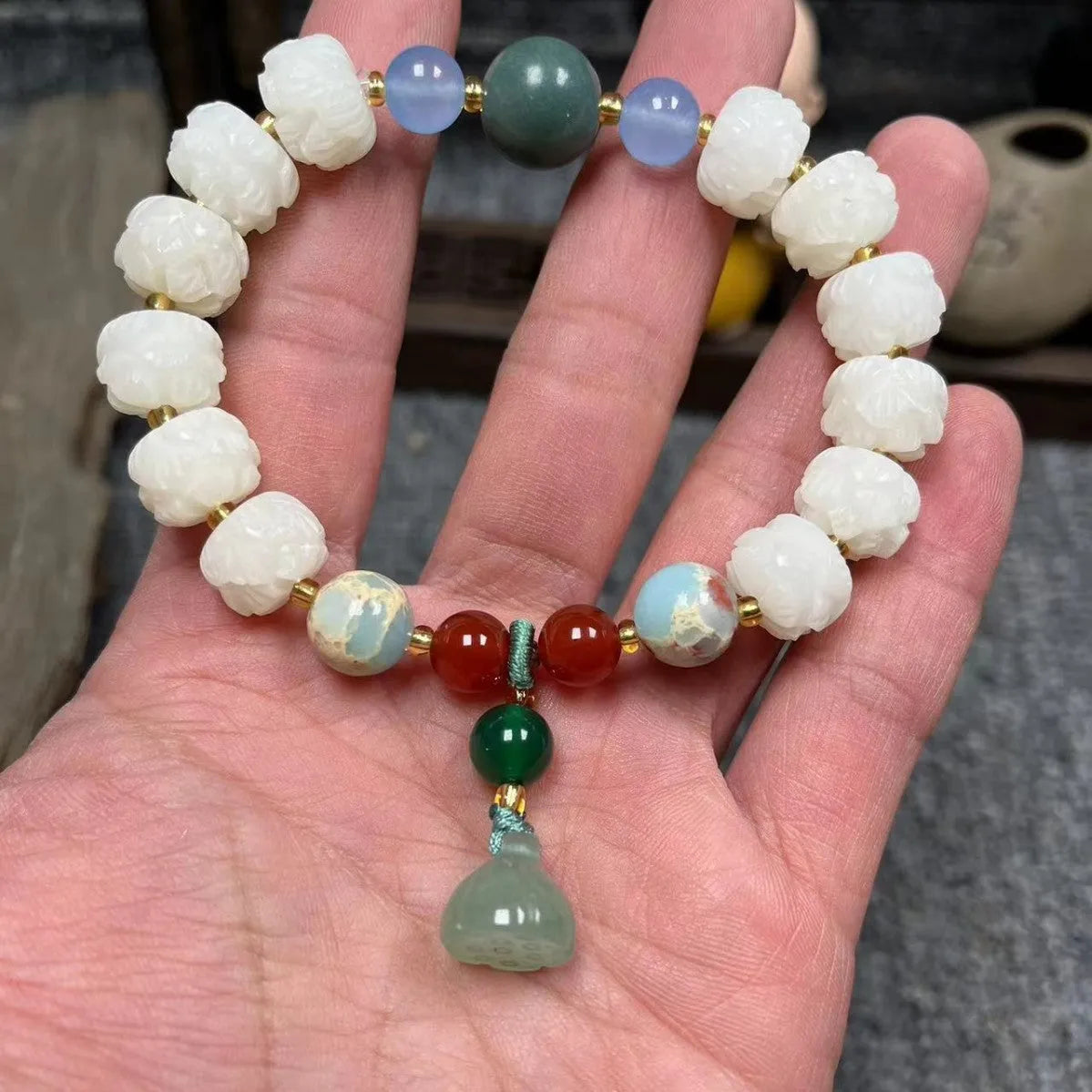 White Bodhi root bracelet with carved pumpkin lotus beads including Apple Orchard and Duobao styles