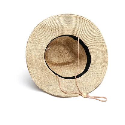 Man's foldable natural straw sun hat with a wide brim shown in mixed beige colour.