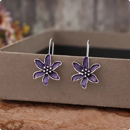 Purple flower-shaped alloy earrings with electroplated finish and post fastening