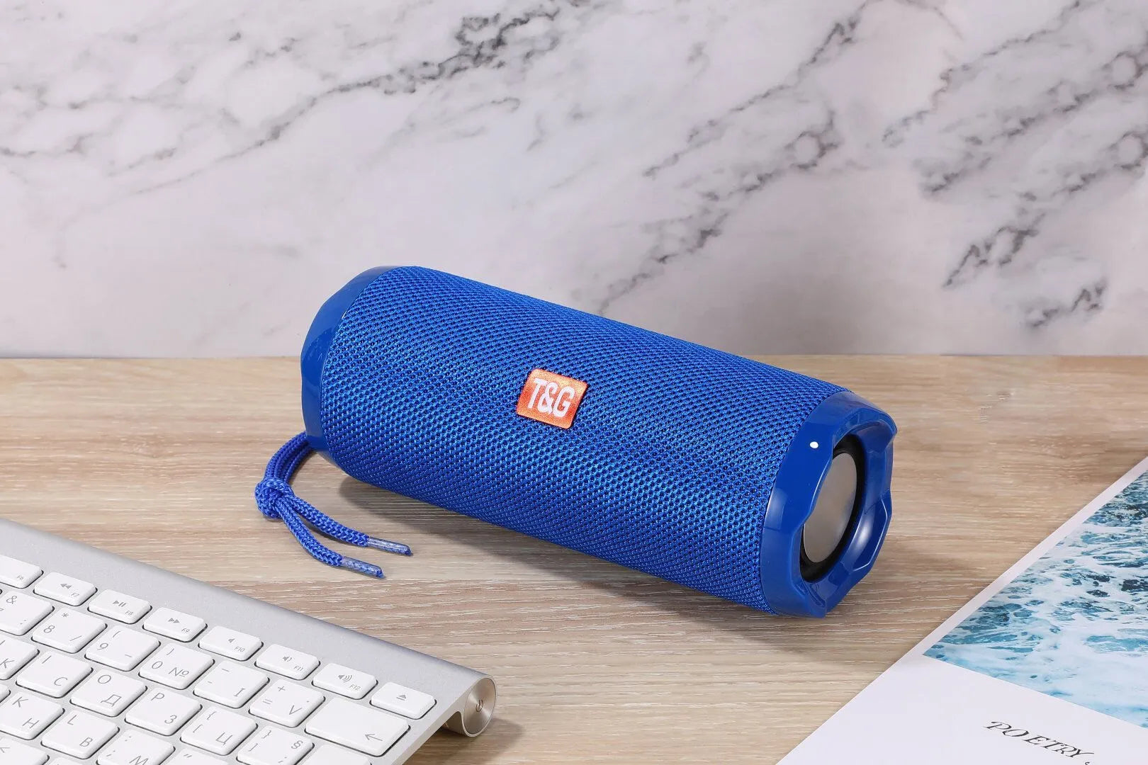 Fabric portable Bluetooth speaker with card holder in blue colour showing compact 182×73.5×69.2mm dimensions