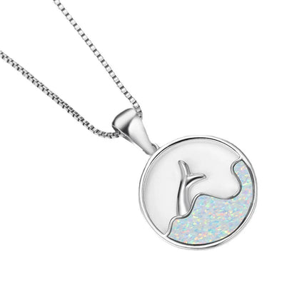 White gold electroplated copper necklace with round blue opal pendant and geometric fishtail design on adjustable chain