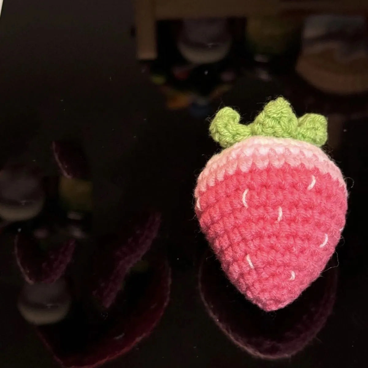 Red and pink plush strawberry pendant keychains with soft texture