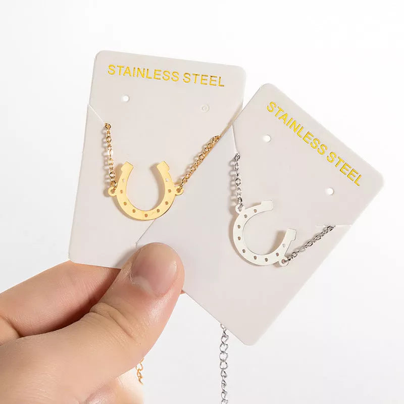Punk Horse Shoe Chain Bracelet in gold and steel colors, featuring a unique U-shape charm