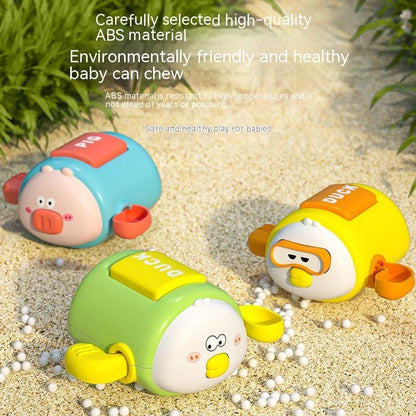 Children's wind-up bath toy measuring 8.2x9.4x5cm with chain attachments in blue pig design