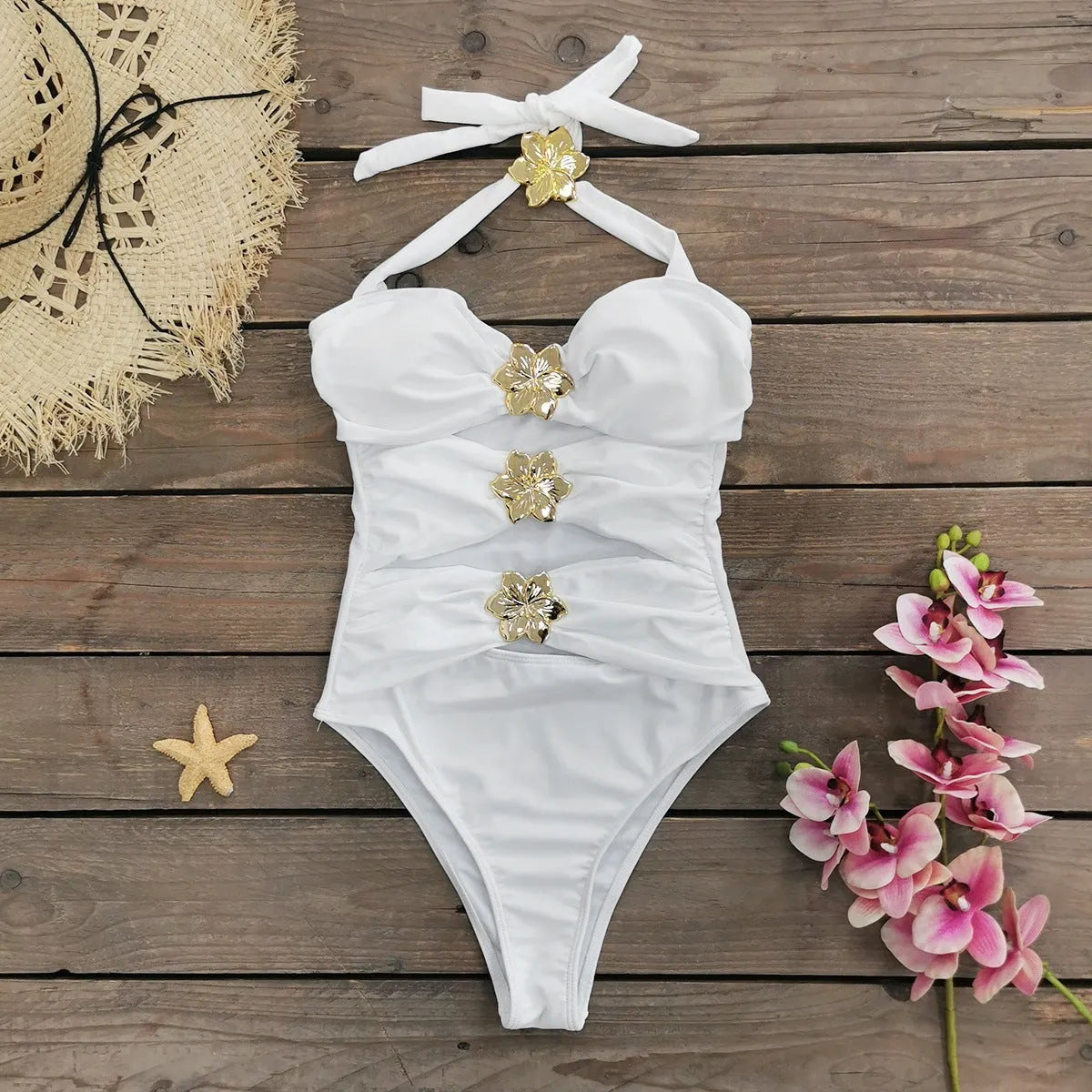 Solid colour women's one-piece swimsuit with hollow-out tube top and detachable short skirt on a mannequin.