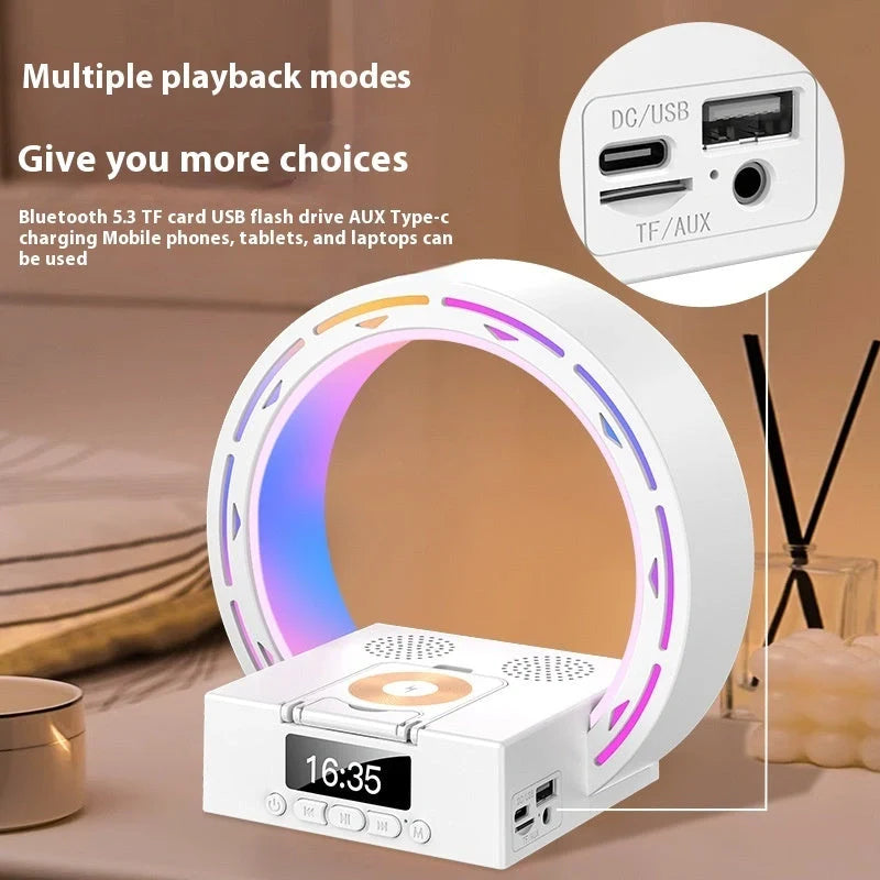 4-in-1 Wireless Bluetooth Speaker with charging pad, lamp, and alarm clock in white and black