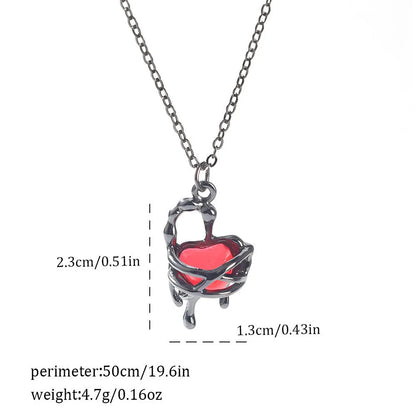 Gothic style zinc alloy necklace with bat pendant on a silver chain against dark background.