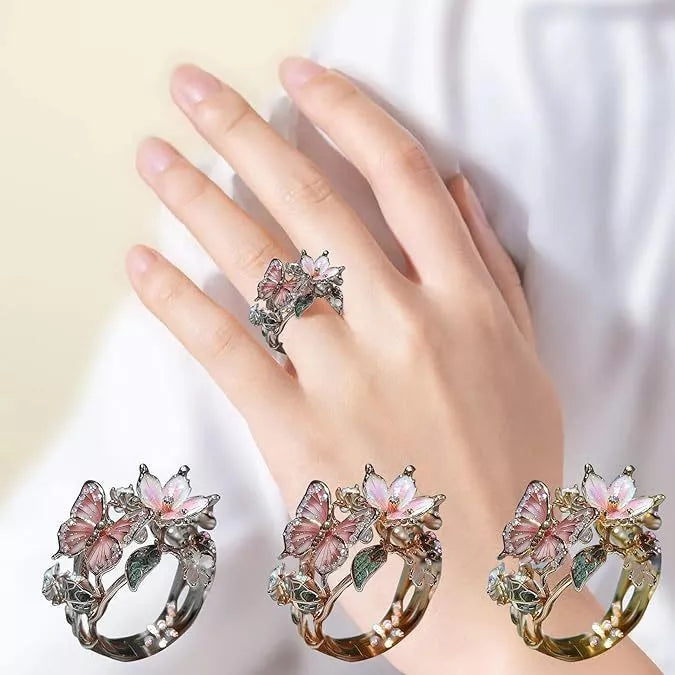 Adjustable crystal butterfly flower ring in gold, silver, and rose gold finishes