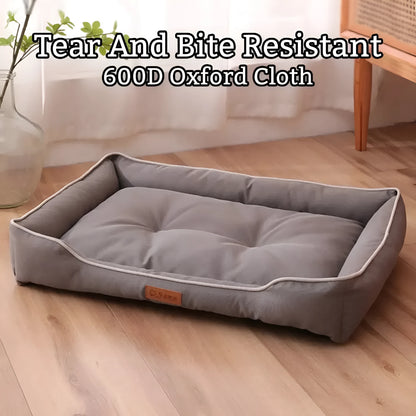 Grey waterproof Oxford cloth dog sofa bed on a wooden floor