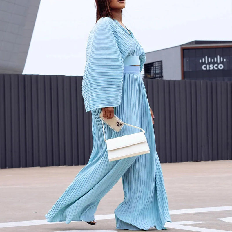 Wide leg trousers two-piece set in sapphire blue or red with batwing sleeves, made from 100% polyester fabric, available in sizes S to XXXL for versatile styling options.