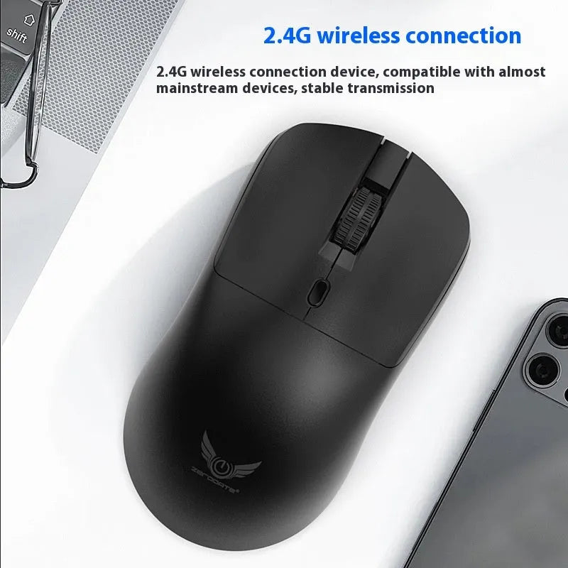 Black wireless computer mouse with three-gear audio button showing top view