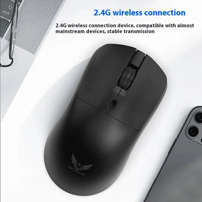 Black wireless computer mouse with three-gear audio button showing top view