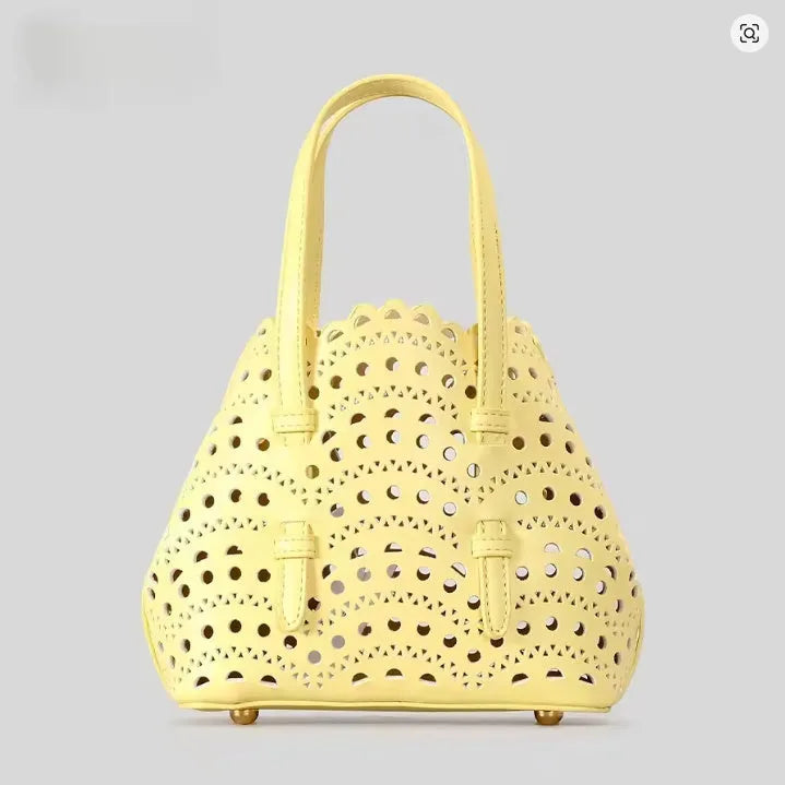 Hollow carved PU messenger tote bag with three straps in horizontal square shape