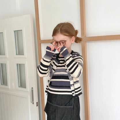 Grey striped knitted vest and jacket two-piece set with long sleeves on mannequin