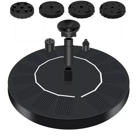 Solar-powered fountain with LED lights illuminating water stream in garden setting