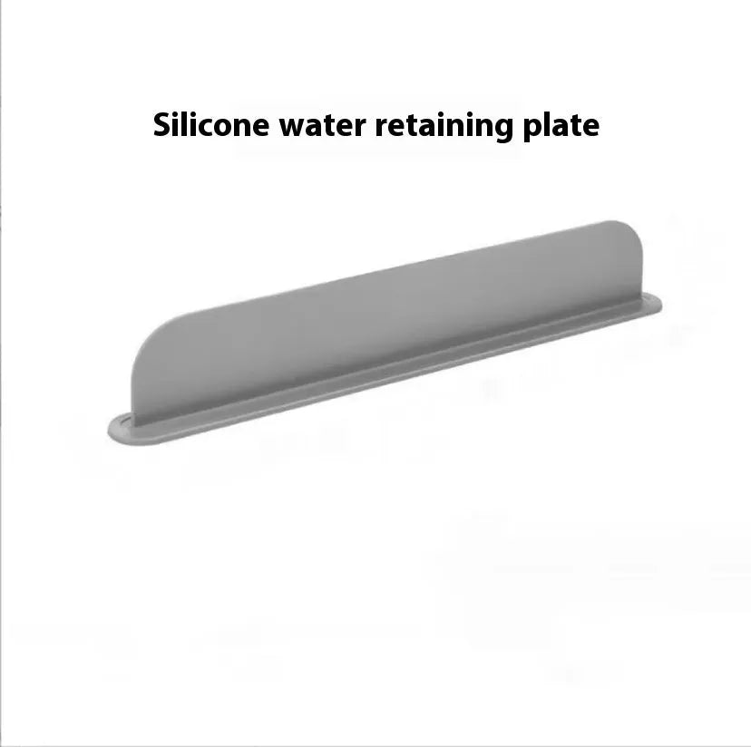 Grey silicone sink water blocking plate showing 52mm height and 85mm length dimensions
