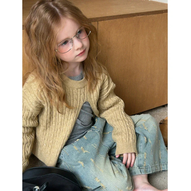 Girls' cotton knitted pullover in lotus root colour with single-breasted placket, shown on hanger