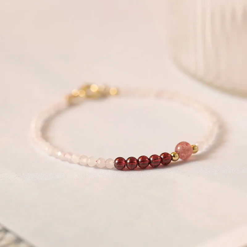 Handmade pink crystal bracelet with strawberry quartz sections, available in 14cm, 15cm and 16cm lengths