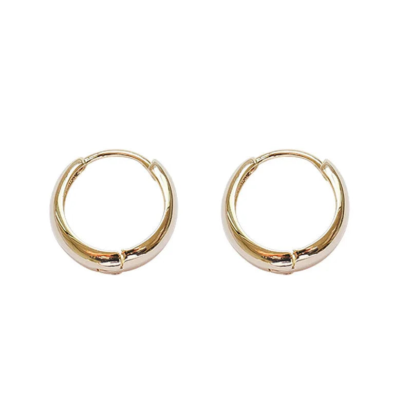 Women's retro minimalist water drop earrings in geometric round shape available in gold or silver colour with three size options