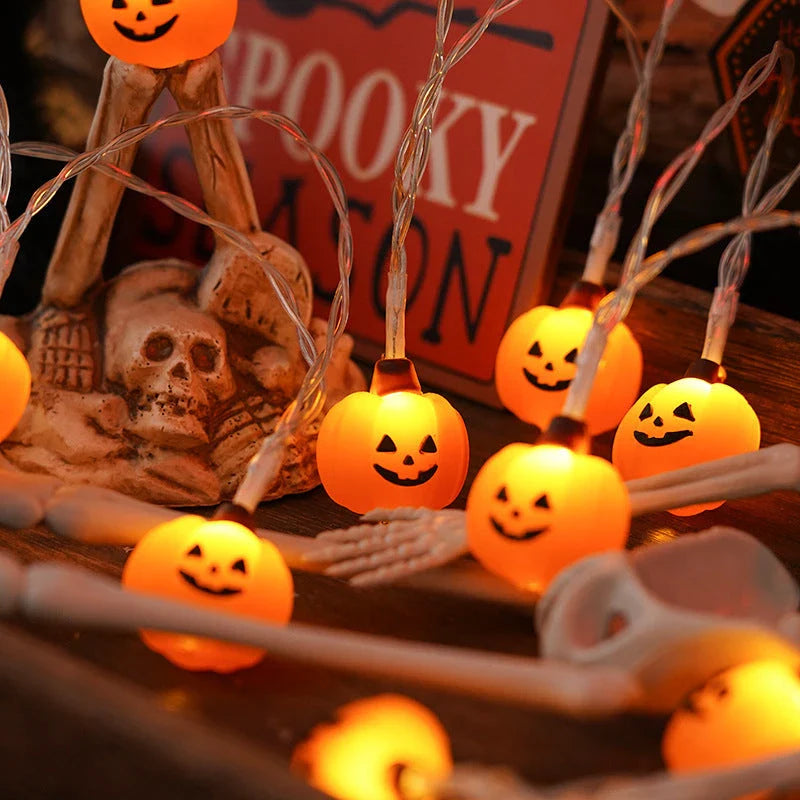 Warm glowing Halloween lighting chain with pumpkins, ghosts, and bats for indoor and outdoor decoration