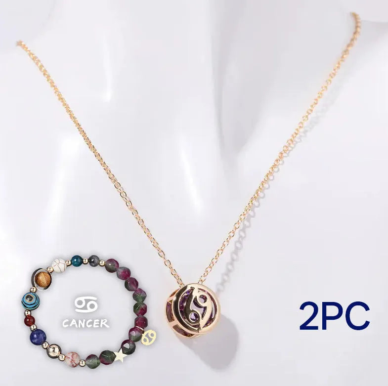 Natural stone beaded necklace and bracelet set laid out flat, showing the coordinated design and textured beads.