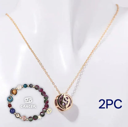 Natural stone beaded necklace and bracelet set laid out flat, showing the coordinated design and textured beads.