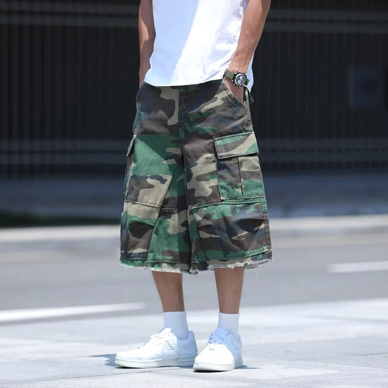 American-style retro workwear shorts, high-street camo design, polyester and cotton fabric, loose-fit cropped length for summer wear, available in multiple camouflage colourways and sizes including 3XL.