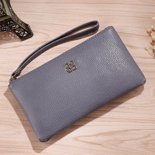 Long 55 cm PU leather wallet handbag in wine red colour with zipper closure open showing interior phone pocket and card slots
