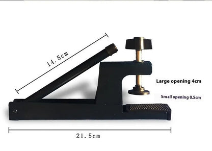 Table tennis post with universal large clip attached to indoor open grid table for ball retrieval practice