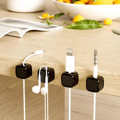 Black and white magnetic cable clips for under desk cable management with adhesive backing
