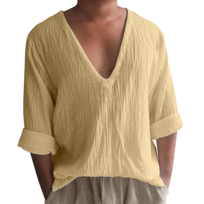Men's washed cotton long sleeve V-neck t-shirt in a solid colour on a hanger.