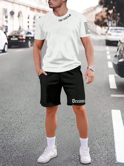 Man wearing a grey short-sleeve sports top and matching shorts from the quick-dry polyester set.