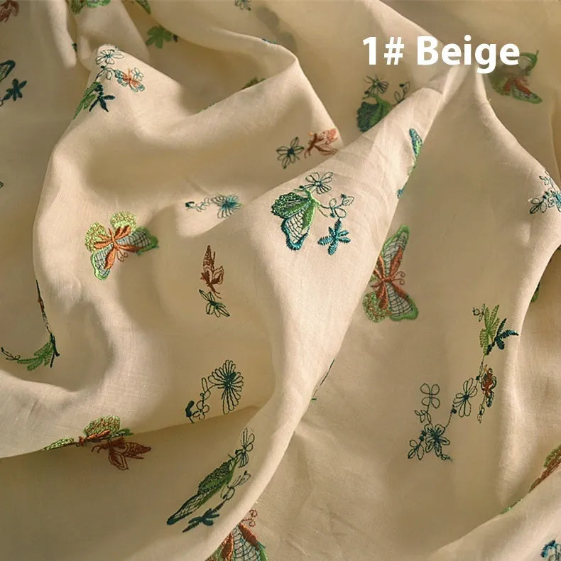 Pure ramie embroidery cloth hanfu fabric in beige, grass green, and dark green colours showing natural texture