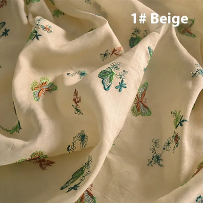Pure ramie embroidery cloth hanfu fabric in beige, grass green, and dark green colours showing natural texture