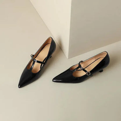 Women's black leather square toe high heel shoes with a 6-8cm heel on a plain background.