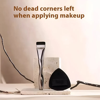 Black spiral powder foundation brush with plastic handle and protective pineapple-patterned travel box