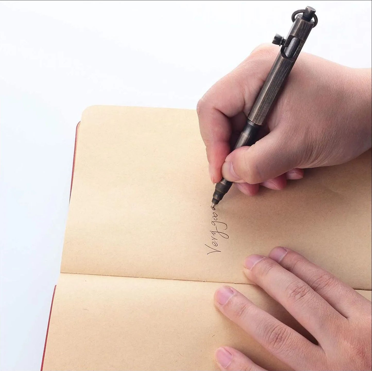 Brass tactical pen with hexagonal bolt design showing natural brass colour option