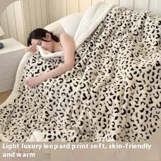 Double-layer cationic leopard jacquard taffeta blanket showing raised animal print pattern in available colour options