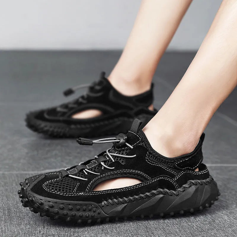 Men's black waterproof sports sandals with leather mesh upper, elastic band, and rubber sole.