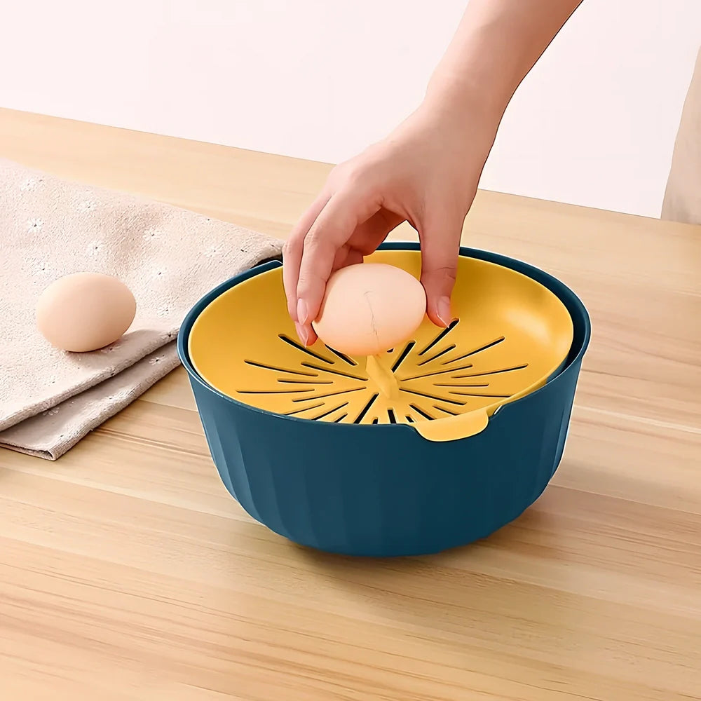 Blue and yellow kitchen egg separator with drainage channels for yolk and white separation