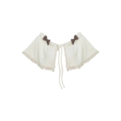 Apricot knitted top with brown hip skirt and apricot shawl three piece set in sizes S, M, and XS