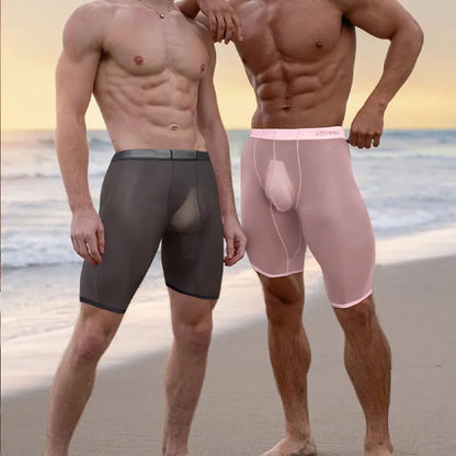 Fashion Personality men's black seamless mesh lounge shorts on a hanger, showing hip-lift design and knitted texture.